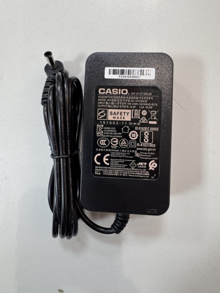 AD-A12150LW оригинал  (12.0V 1.5A 18W)  Адаптер питания для  пианино и синтезаторов Casio